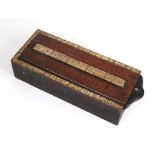 A Folk Art cribbage board box containing a set of dominoes, 28cms (11ins) long.Condition Report Loss