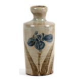 A Japanese Edo period tokkurai (sake bottle) decorated with a blue flower, three character mark to