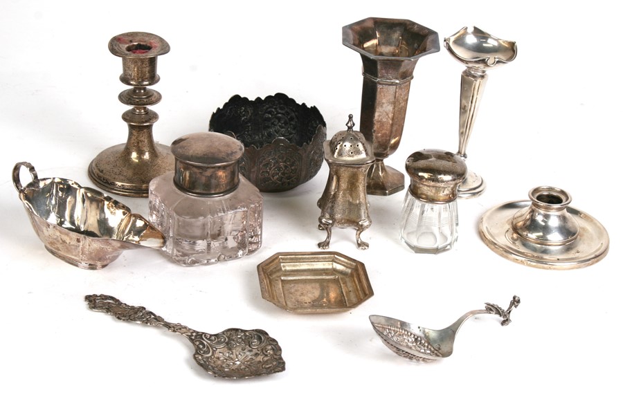 A quantity of silver items to include vases, spoon, jug and other items.