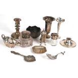A quantity of silver items to include vases, spoon, jug and other items.