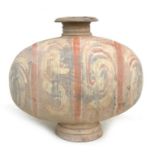 A Chinese earthenware cocoon jar, Han dynasty, the shape in imitation of a silkworm cocoon,
