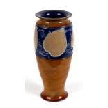 An Art Nouveau Doulton Stoneware vase decorated with stylised flowers, 27cms (10.5ins) high.