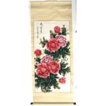 A 20th century Chinese scroll painting depicting camellias and calligraphy, 64 by 129cm (25 by