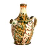 An Italian maiolica wine ewer, 20cms (8ins) high.