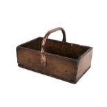 A wooden trug with copper handle, 43cms (17ins) wide.