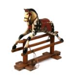 A Patterson Edwards / Leeway carved and painted wooden rocking horse, circa 1930's, overall 89cms (