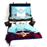 A quantity of Masonic regalia including aprons and jewels in a leather case.