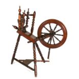 An elm spinning wheel.