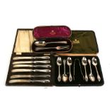 A boxed set of six Mappin & Webb silver teaspoons and sugar tongs; together with a boxed fork &