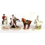 Three continental porcelain horse groups; together with a Chinese Tang style horse, the largest