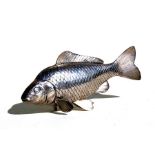 A late 19th / early 20th century Japanese white metal (tests as silver) koi carp, 20cms (8ins)