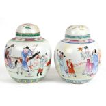 Two Chinese famille rose ginger jars decorated with figures, the largest 20cms (8ins) high.Condition