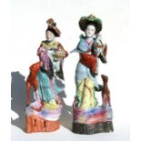 Two large Chinese Republic period figures depicting robed ladies with deer, one with impressed