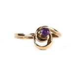 A 9ct gold dress ring set with a single amethyst, approx UK size 'M'.