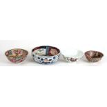 Two Chinese millifiori bowls, the largest 13cms (5ins) diameter; together with a Chinese bowl