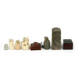 A collection of Chinese seals to include ivory, hardstone and wood examples, the largest 8cms (3.