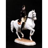 A Vienna porcelain figure of a man on horseback, designed by Albin Dobrich, Wien Austria,