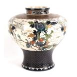 A large Japanese Imperial Meiji period Imperial Satsuma vase decorated with flowers, signed to the