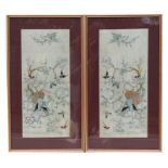 A pair of 19th century Chinese silk embroidered panels decorated with birds and butterflies