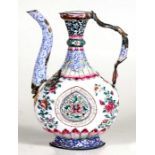 An 18th century Chinese Canton enamel ewer made for the Islamic market, decorated with flowers and