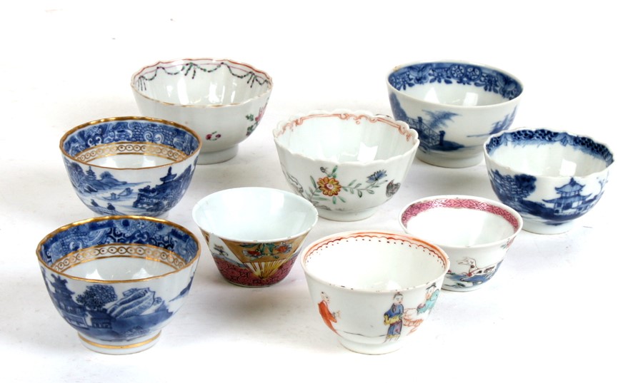 A group of 18th and 19th century Chinese tea bowls, including blue & white and famille rose
