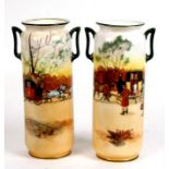 A pair of Royal Doulton Series Ware vases decorated with a coaching scene, 22cms (8.5ins) high.