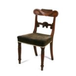 A William IV mahogany chair with carved splat, on turned front legs.