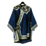 A Chinese silk embroidered robe with embroidered collars and cuffs on a blue ground with gilt
