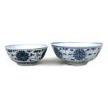 A Chinese blue & white bowl decorated with lotus flowers, six character mark to underside, 19cms (