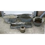 Three graduated galvanised tin baths, the largest 85cms (33.5ins) wide; together with a galvanised