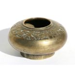 A Chinese bronze censer or brush washer decorated with foliate scrolls to the shoulder, six