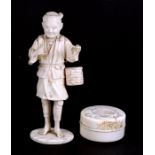 A late 19th century Japanese Meiji period ivory okimono in the form of a peasant, four character