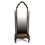 A walnut Cheval mirror, on dwarf cabriole legs, 61cms (24ins) wide.Condition Reportgood overall