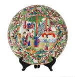 A 19th century Chinese famille rose Canton Export plate decorated with figures on a terrace within a