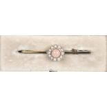 A 15ct gold coral and pearl bar brooch.Condition Report Overall good condition.  syamped 15ct