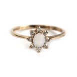 A 9ct gold opal cluster dress ring, approx UK size 'N'.