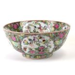 A large Chinese famille rose bowl decorated birds amongst flowering foliage. 31cm (12.25 ins)