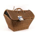 A wicker basket, 60cms (23.5ins) wide.