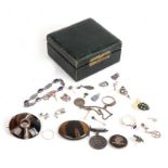 A quantity of silver jewellery to include agate brooches, in a green leather jewellery box.