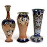 Three Royal Doulton stoneware vases, the largest 28cms (11ins) high (3).Condition Reportall pieces