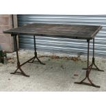 An industrial style heart oak garden table, 141cms (55.5ins) wide.