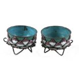 A pair of Chinese white metal and enamel lotus flower cups, 4cms (1.5ins) diameter (2).