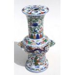 A Chinese Ducai style vase decorated with dragons, phoenix and foliage, 32cms (12.5ins) high.