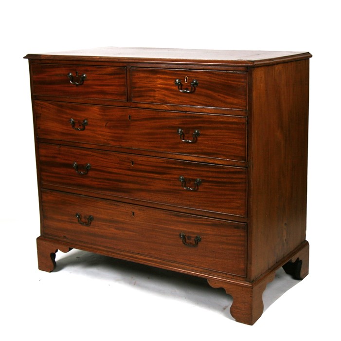 A Georgian mahogany chest with two short and three long graduated drawers, on bracket feet, - Image 2 of 2