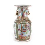 A 19th century Chinese Canton famille rose vase decorated with figures, birds, insects and flowers