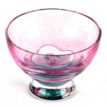 A Caithness footed glass bowl with central flower decoration, 16cms (6.25ins) diameter.