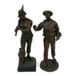 A large pair of bronzed spelter figures depicting peasants at work, 55cms (21.5ins) high.