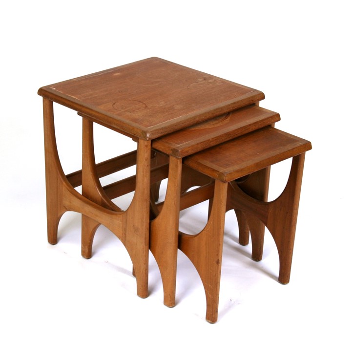 A nest of three 1960's teak tables by Stonehill Furniture Ltd from the Stateroom range, the