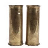 A matching pair of WW1 trench art shell case vases which are elaborately inscribed Souvenir De La