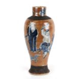 A Chinese crackle glaze vase decorated with figures on a cafe au lait ground, incised mark to